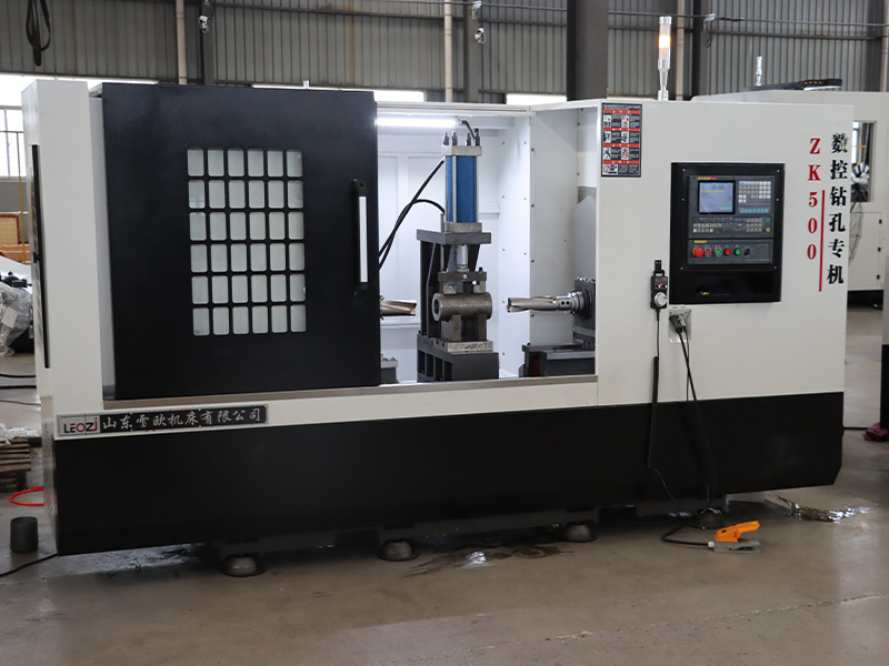 车间新款安装好的ZK500数控双刀头双面钻孔机床